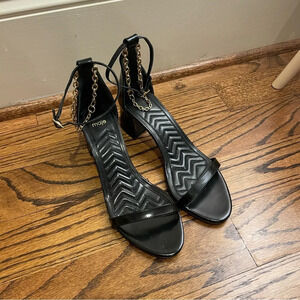 Maje leather ankle sandals with straps and chain